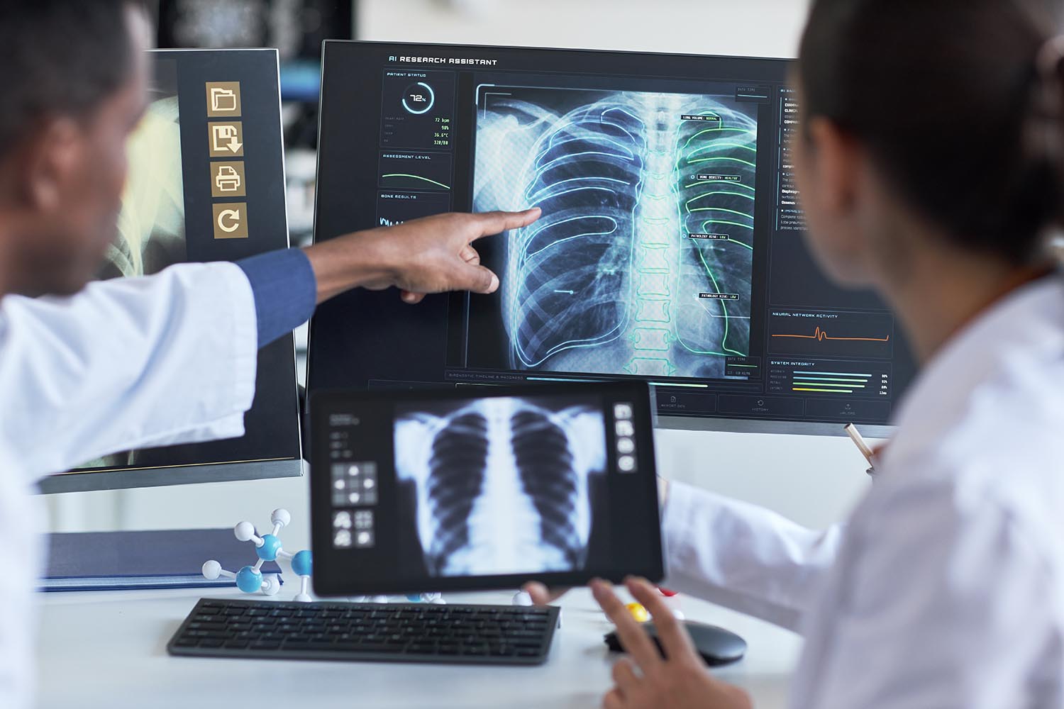 Doctors Reviewing Ai Assisted Chest Scan for Diagnostic Analysis AdobeStock 1979472329