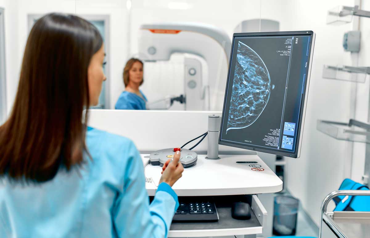 female doctor check on scan results female doctor check on scan results
