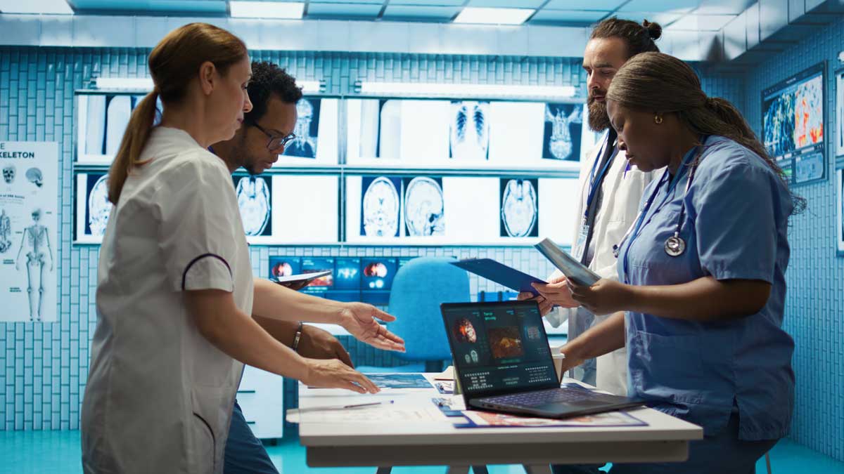 doctors analyze X-ray film doctors analyze X-ray film